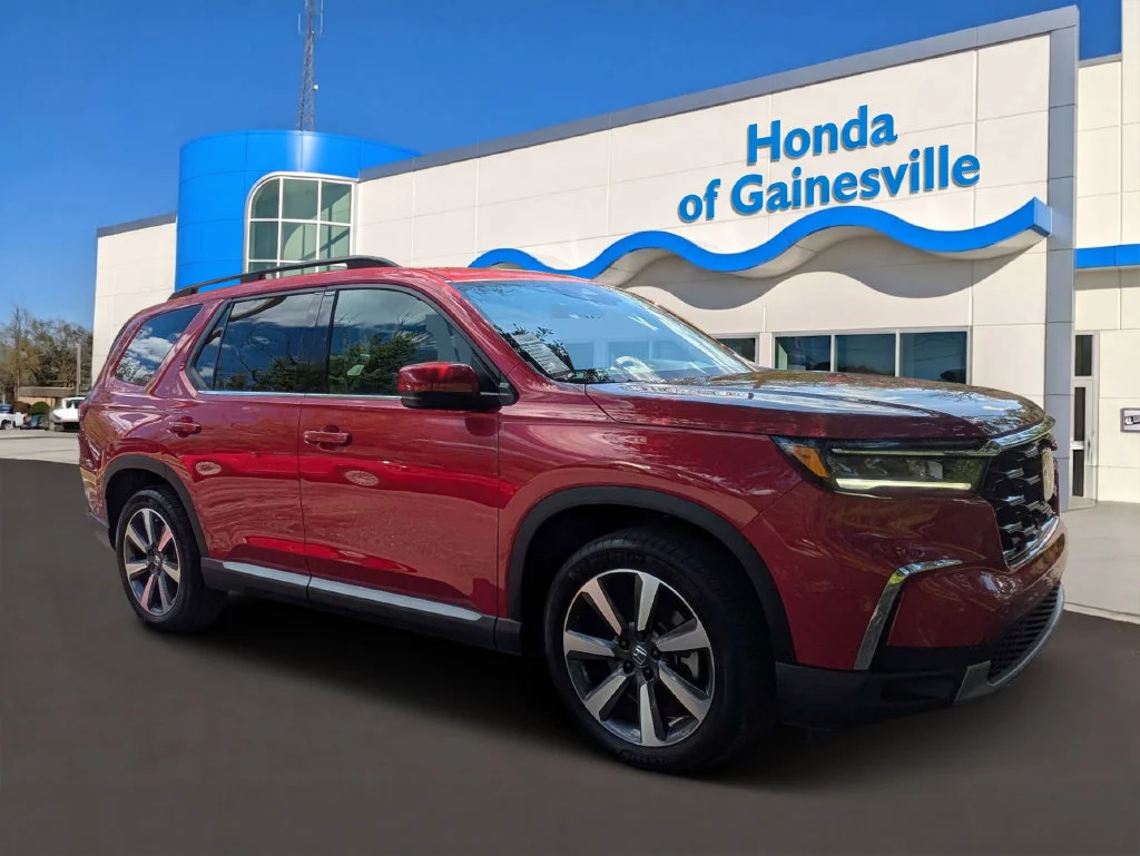 Certified Used 2025 Radiant Red Metallic II Honda 2WD Touring image 1