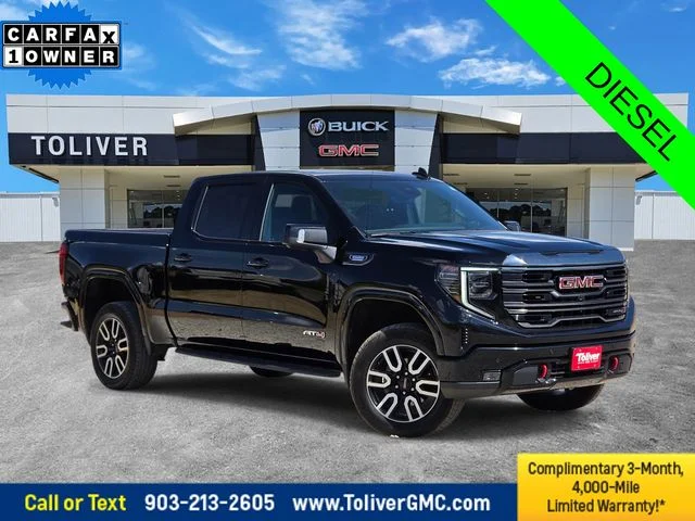 Used 2024 Black GMC AT4 image 1