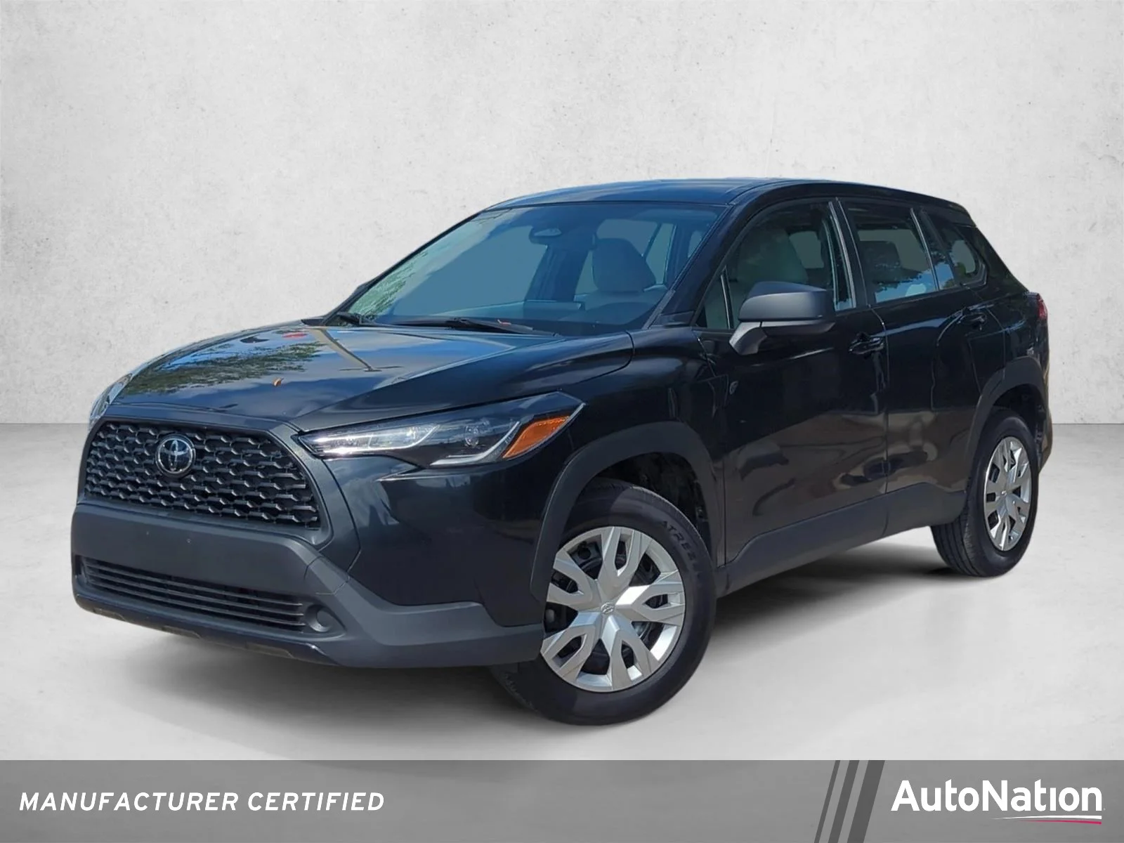 Used 2024 Jet Black Toyota L image 1