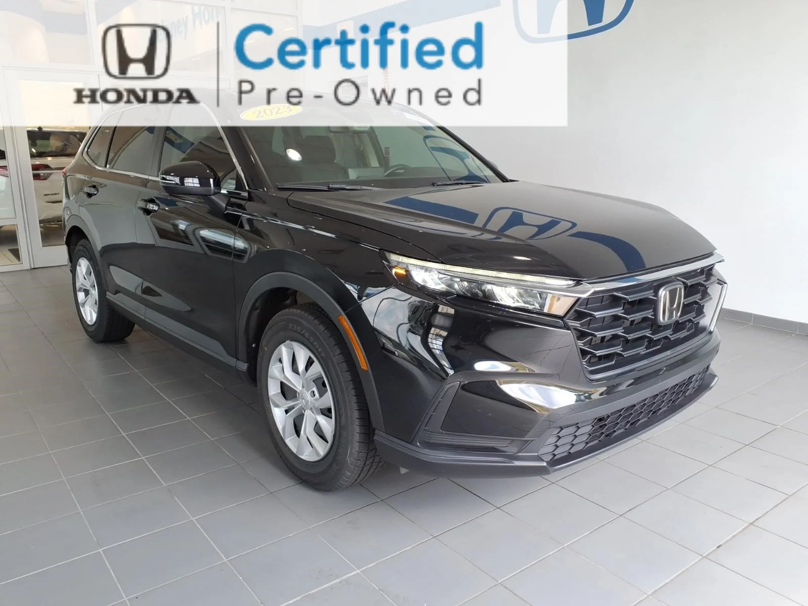 Certified Used 2023 Crystal Black Pearl Honda 1.5T AWD LX image 1