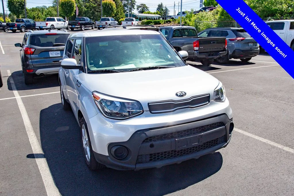 Used 2017 Bright Silver Kia Base image 1