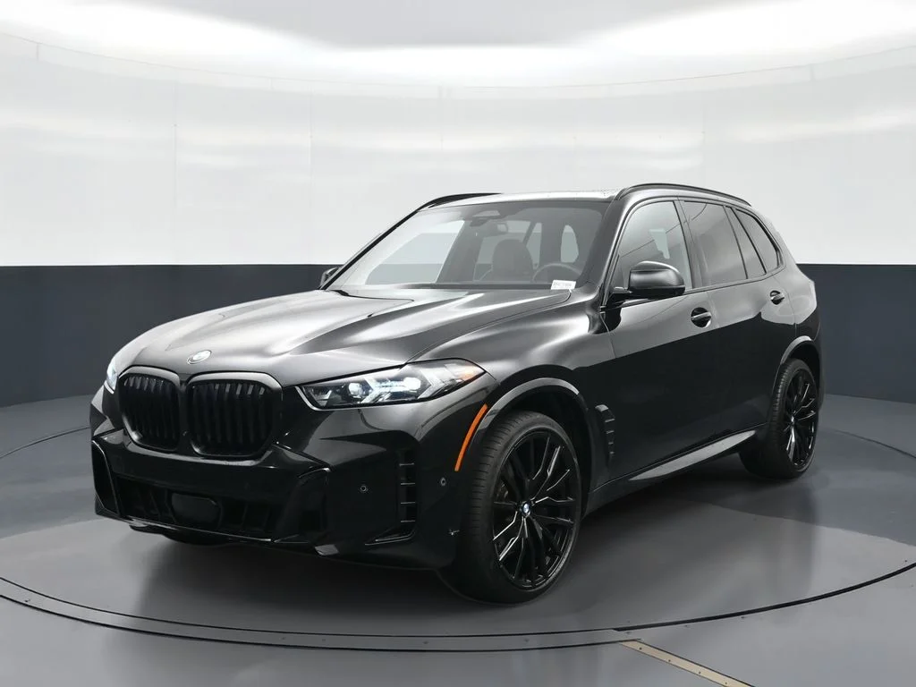 Used 2024 Black BMW xDrive40i image 1