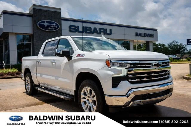 Used 2024 Summit White Chevrolet LTZ image 1
