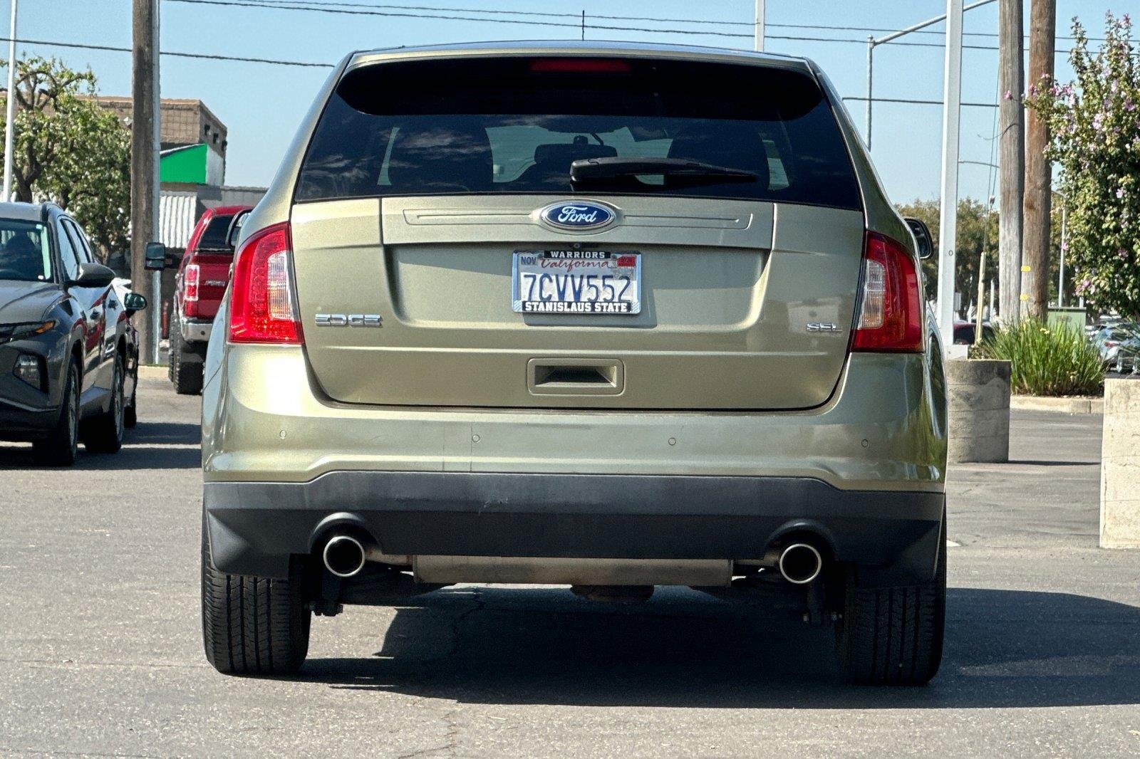 Used 2013 Ginger Ale Metallic Ford SEL image 4