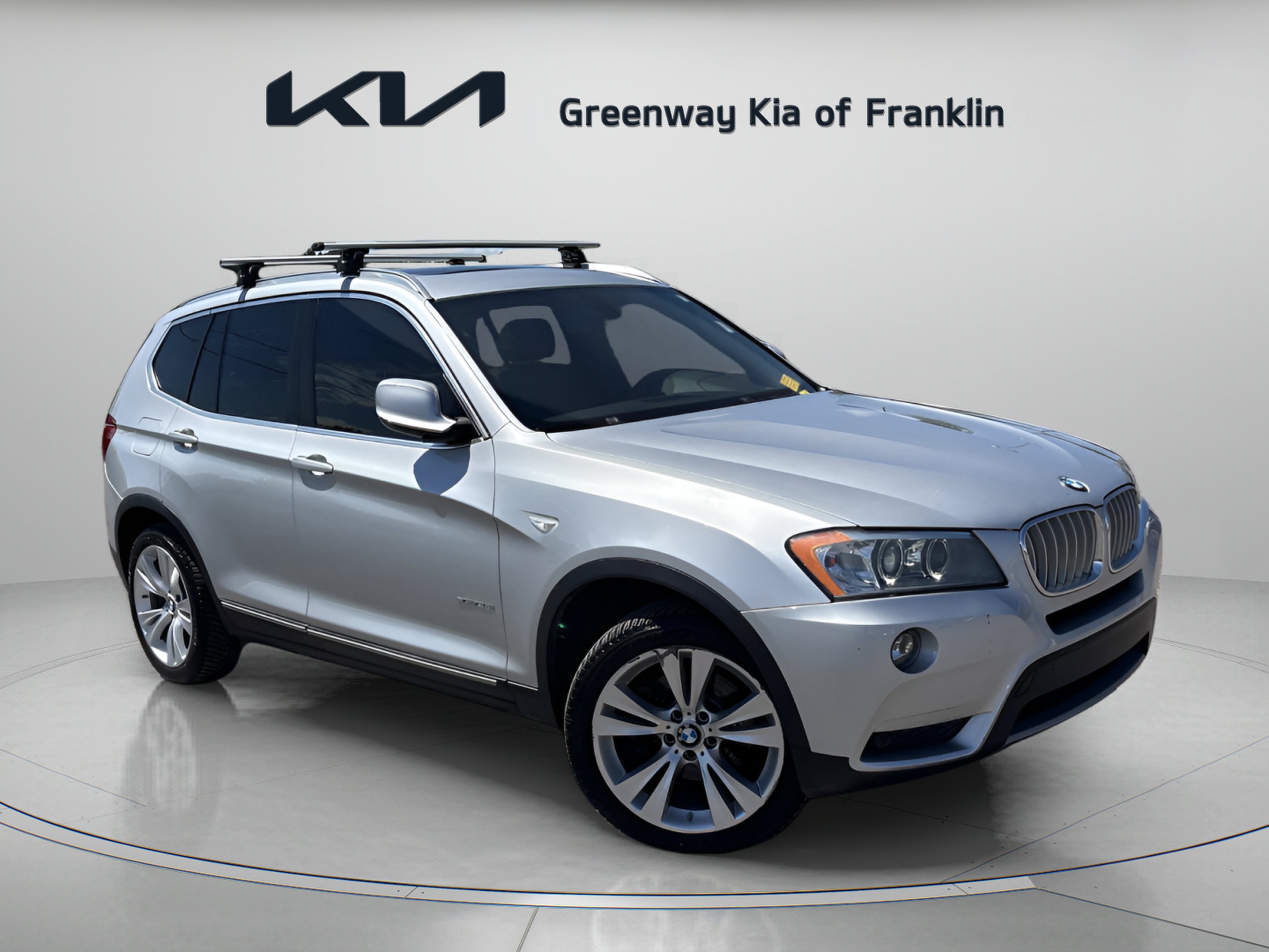 Used 2013 Titanium Silver Metallic BMW xDrive35i image 1