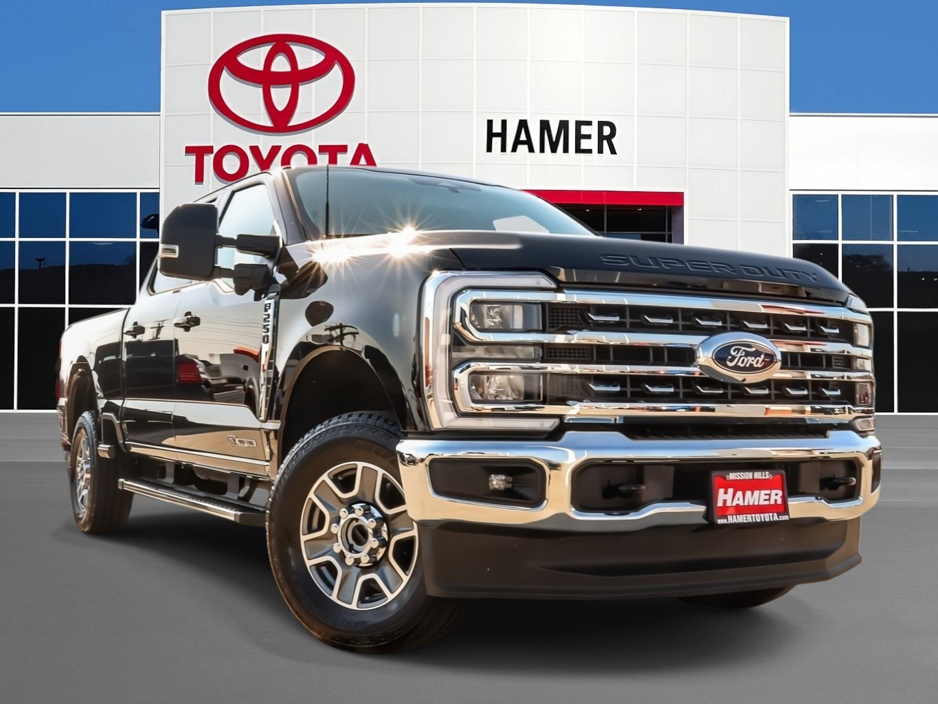 Used 2025 Black Metallic Ford LARIAT image 1