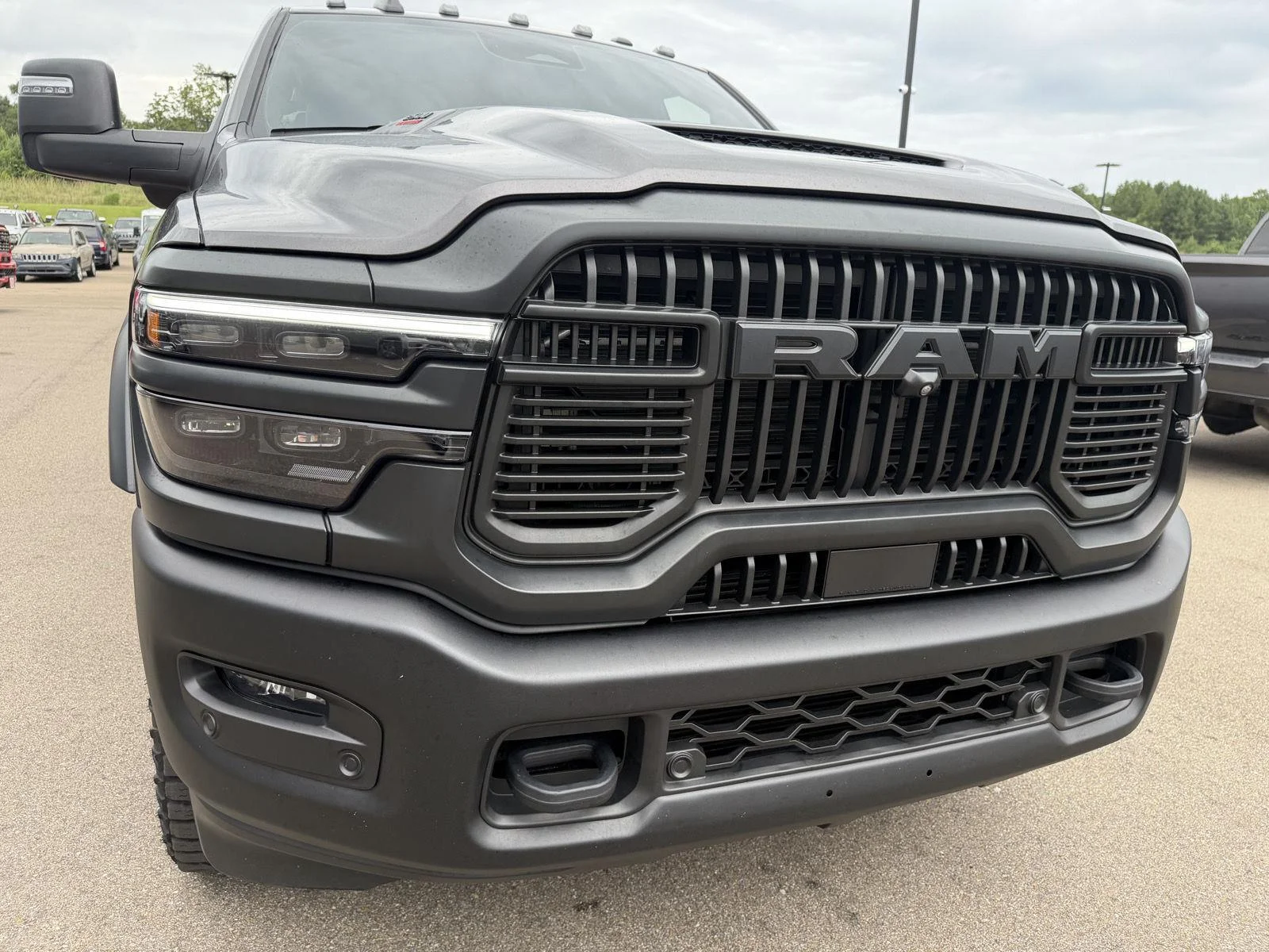 Used 2025 Granite Crystal Metallic Clearcoat Ram Rebel image 24
