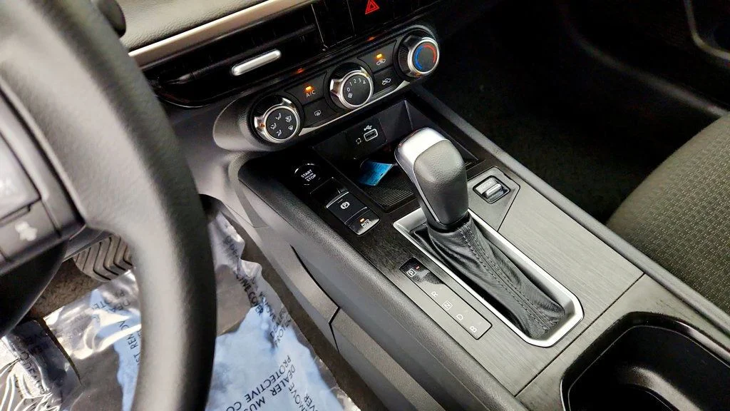 Used 2025 Canyon Bronze Metallic Nissan S FWD image 16