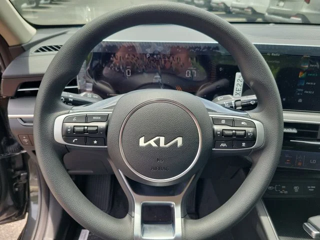 New 2026 Interstellar Gray Kia LXS FWD image 14