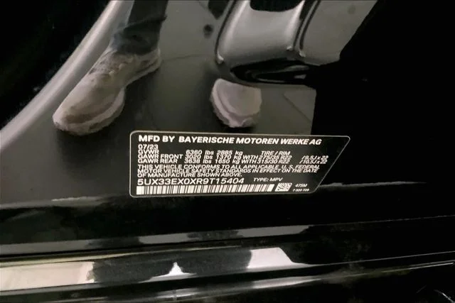 Certified Used 2024 Black Sapphire Metallic BMW xDrive40i image 13