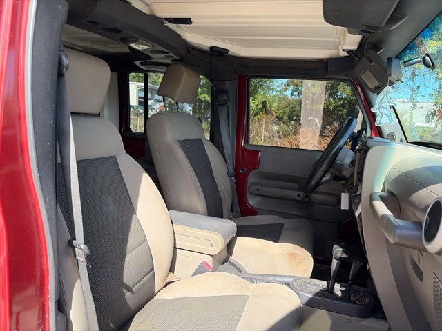 Used 2010 Red Jeep Unlimited Sahara image 13