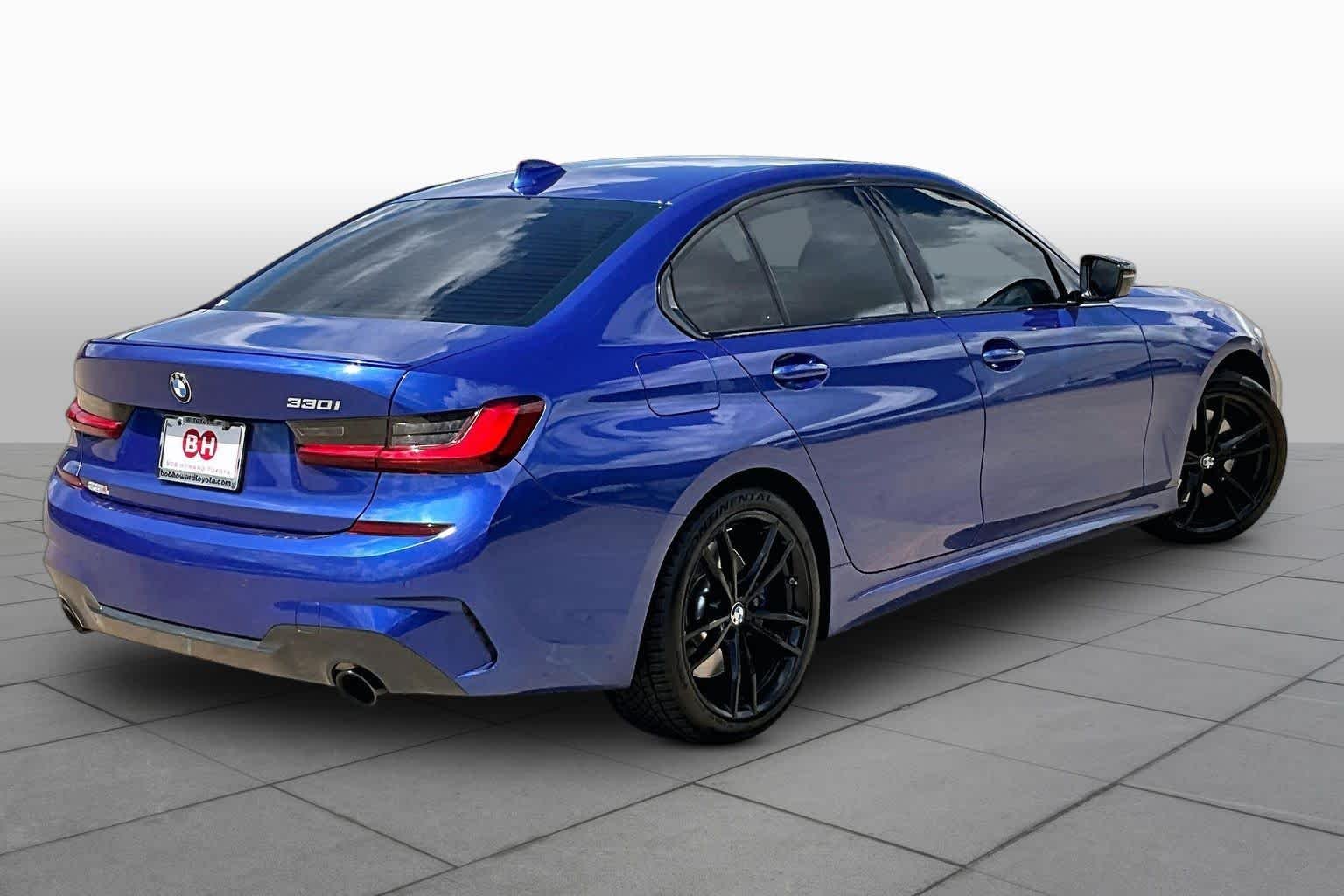 Used 2022 Portimao Blue Metallic BMW 330i xDrive image 13