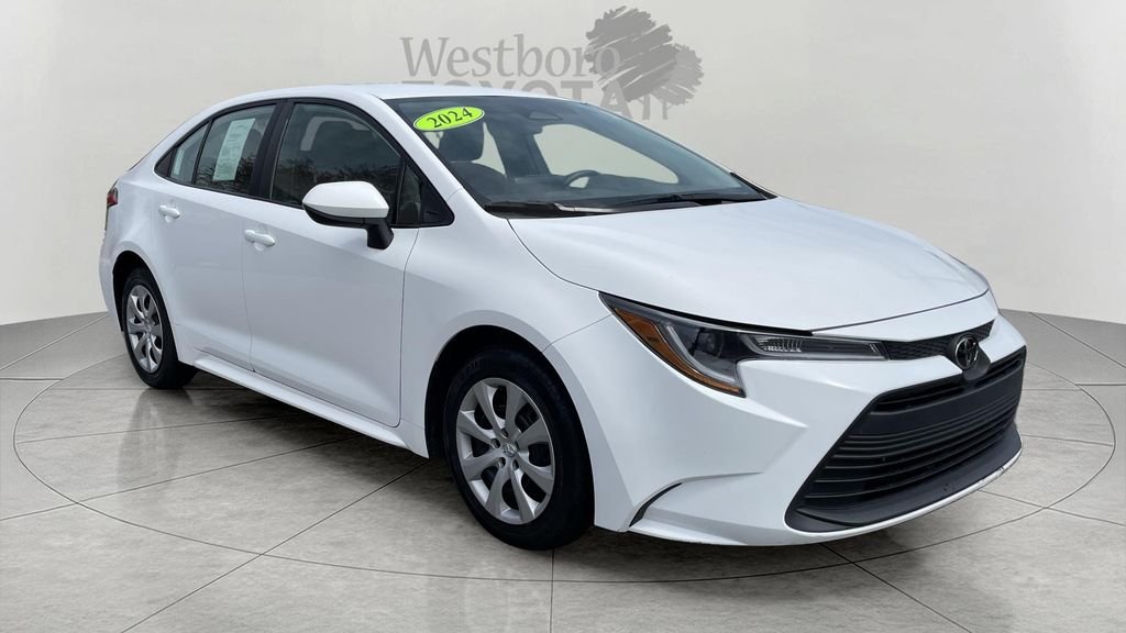 Used 2024 White Toyota LE image 1