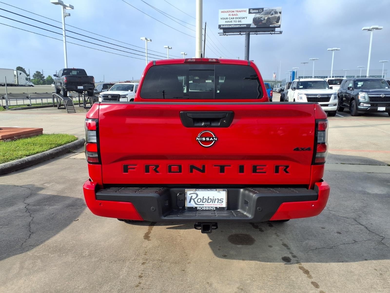 2026 Nissan Frontier SV Red at Robbins Nissan