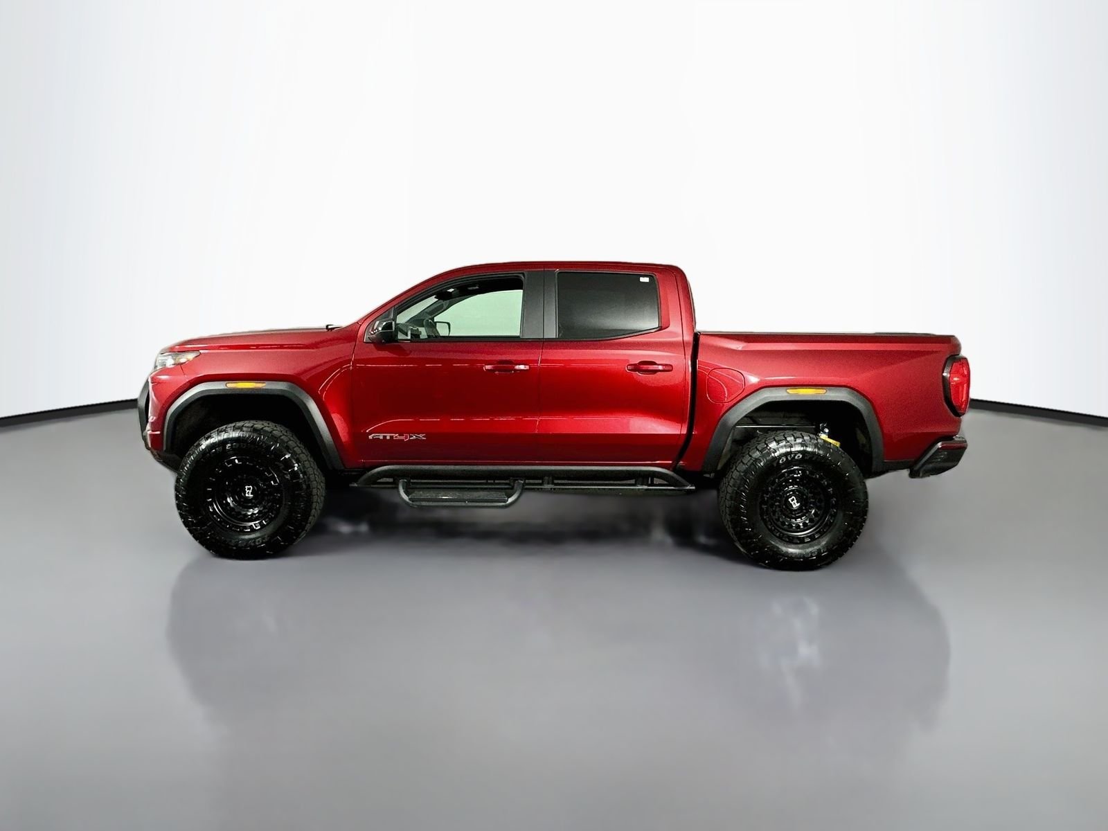 Used 2023 Volcanic Red Tintcoat GMC AT4X image 4