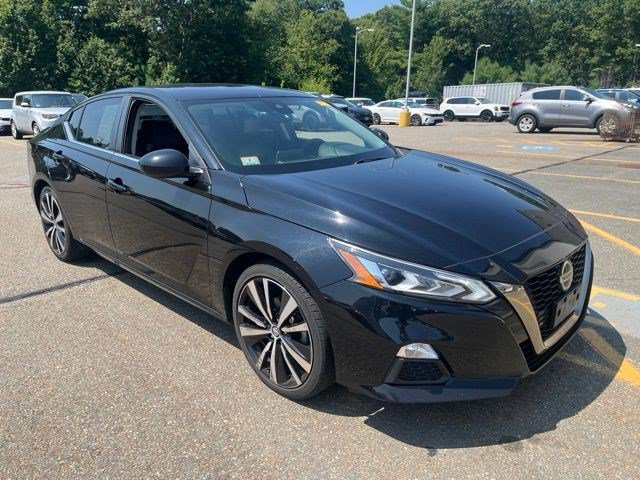 Used 2022 Super Black Nissan 2.5 SR image 1