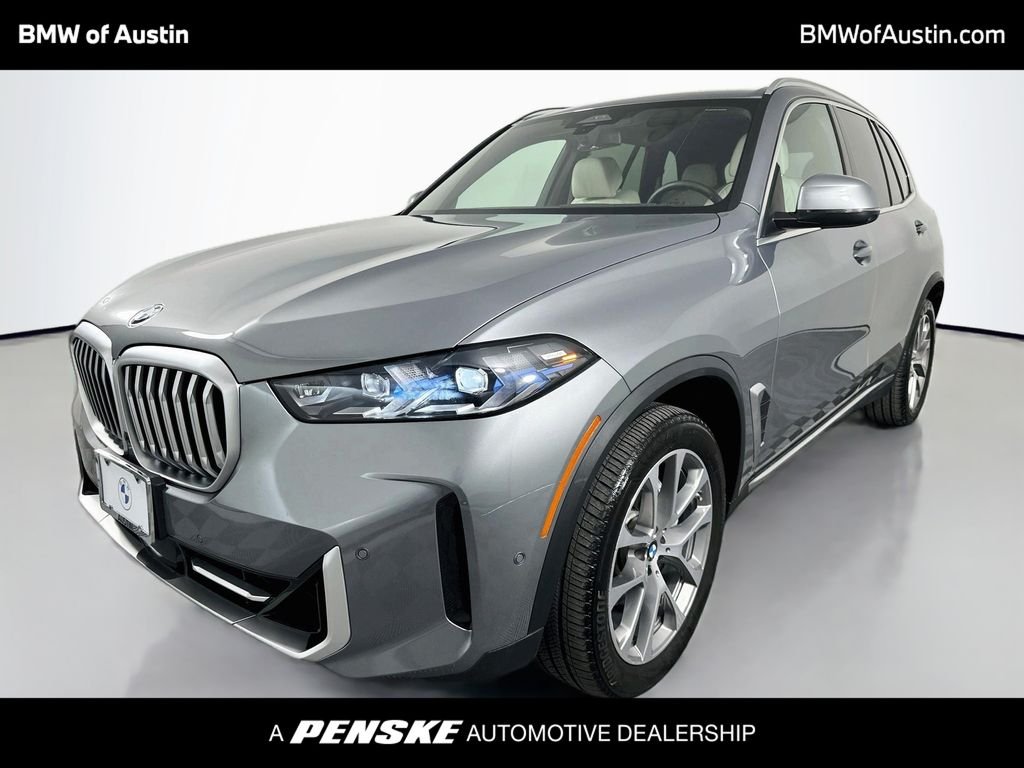 Certified Used 2024 Skyscraper Grey Metallic BMW xDrive40i image 1