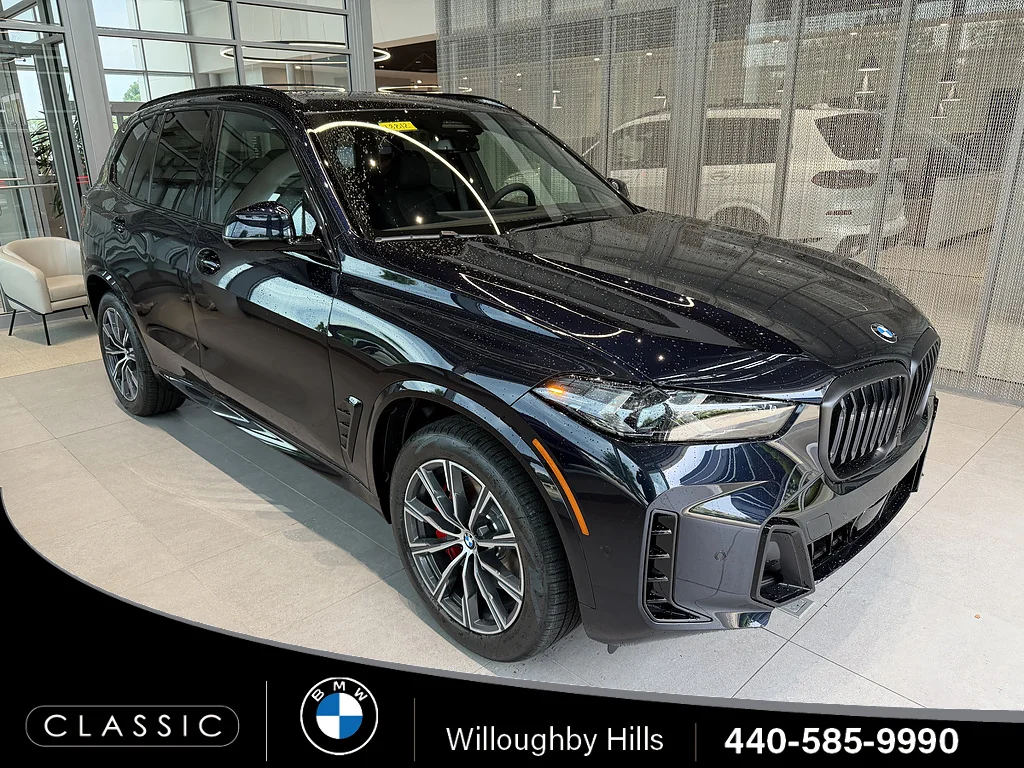 New 2026 Carbon Black Metallic BMW xDrive40i image 1