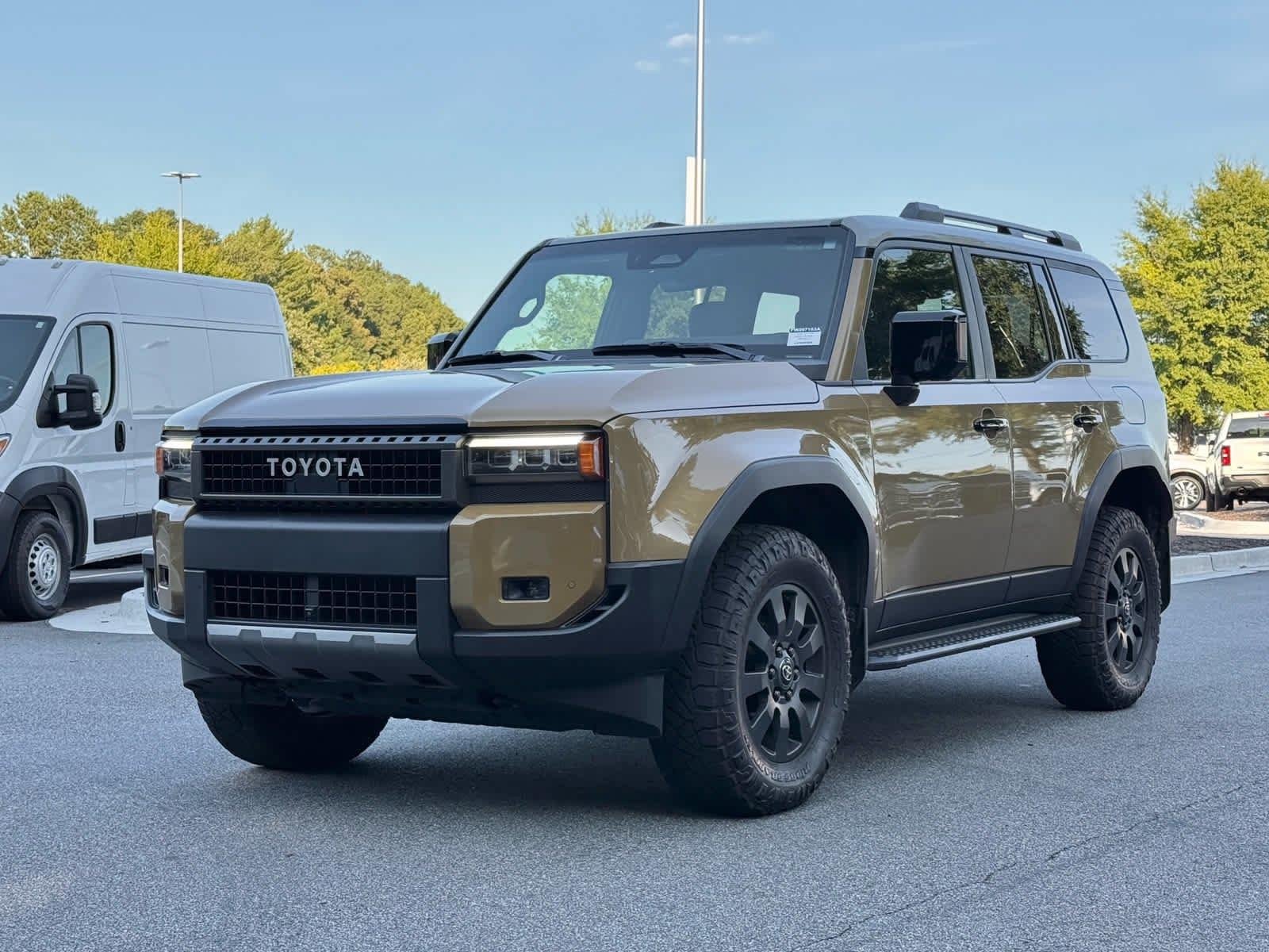 Used 2024 Trail Dust w/Grayscape Roof Toyota BASE image 1