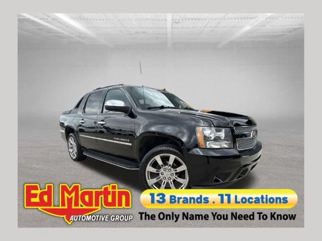 Used 2011 Black Chevrolet LTZ image 1