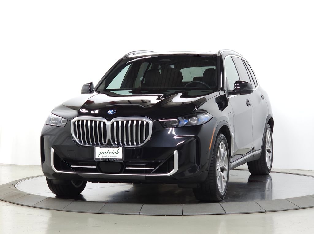 Used 2026 Black Sapphire Metallic BMW xDrive50e image 3