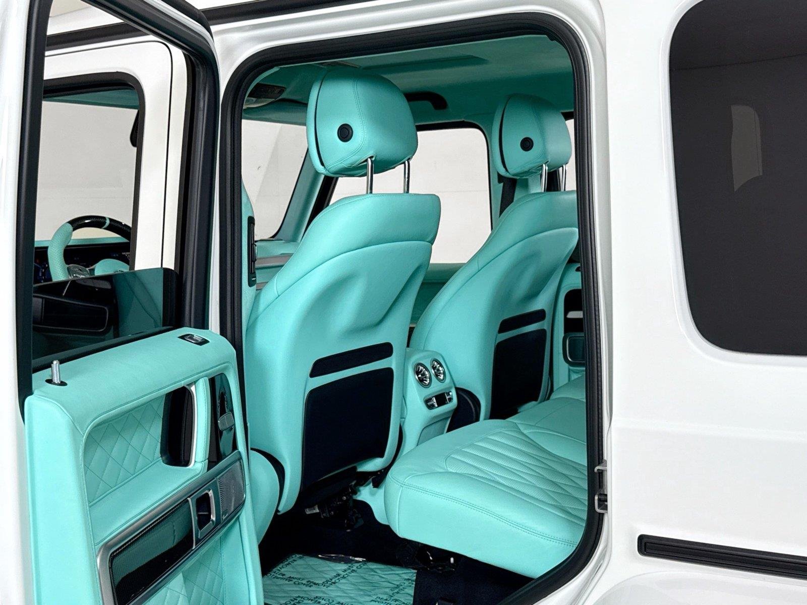 Used 2024 Polar White Mercedes-Benz AMG® G 63  Brabus Custom Widebody / Custom Tiffany Interior image 23