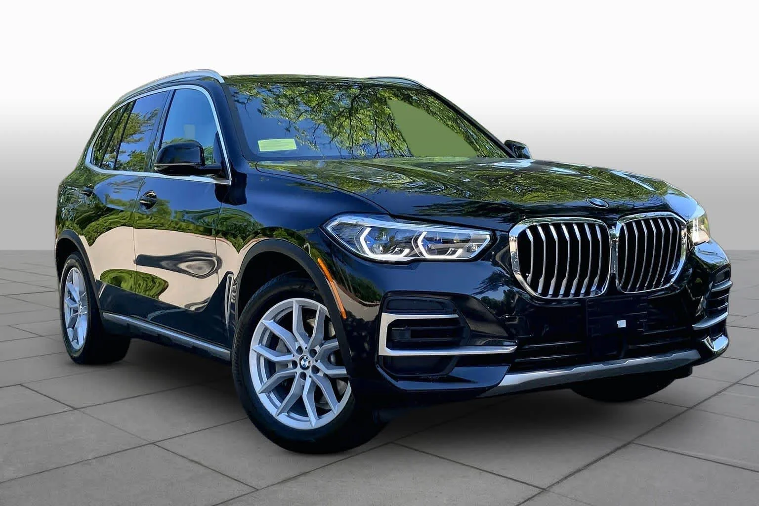 Certified Used 2023 Black Sapphire Metallic BMW xDrive40i image 2