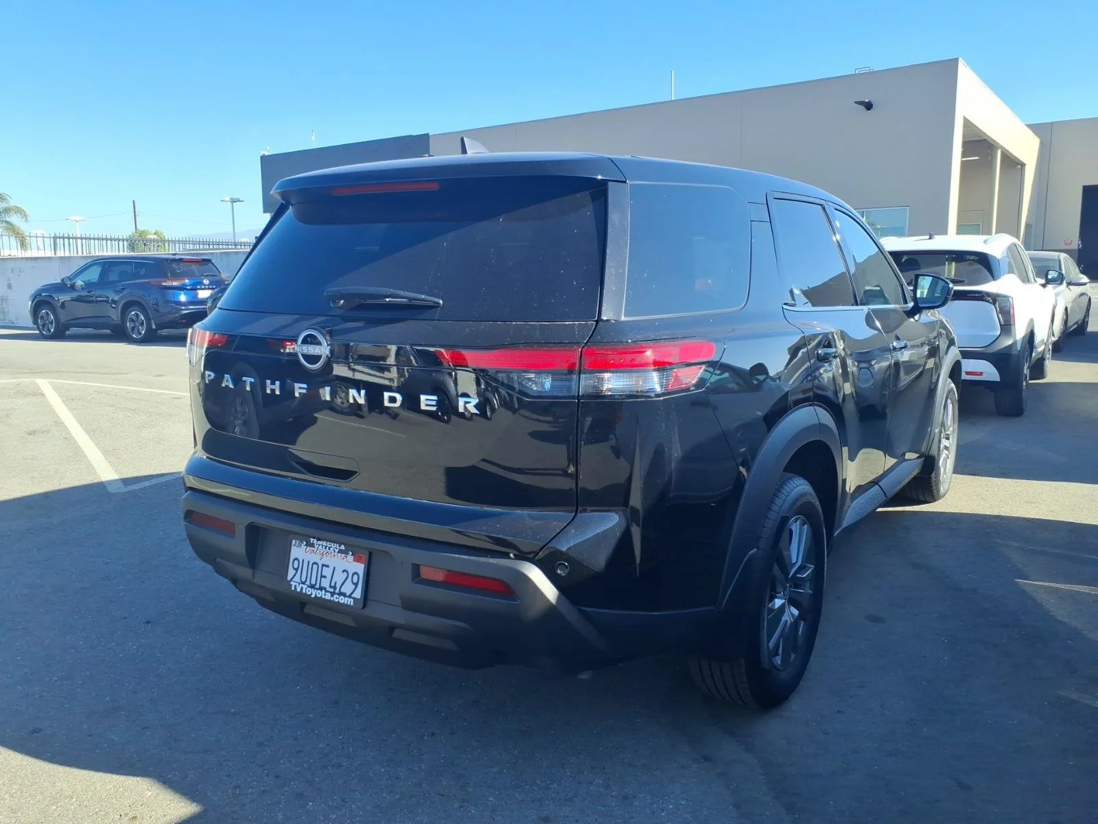 Certified Used 2025 Super Black Nissan S image 8