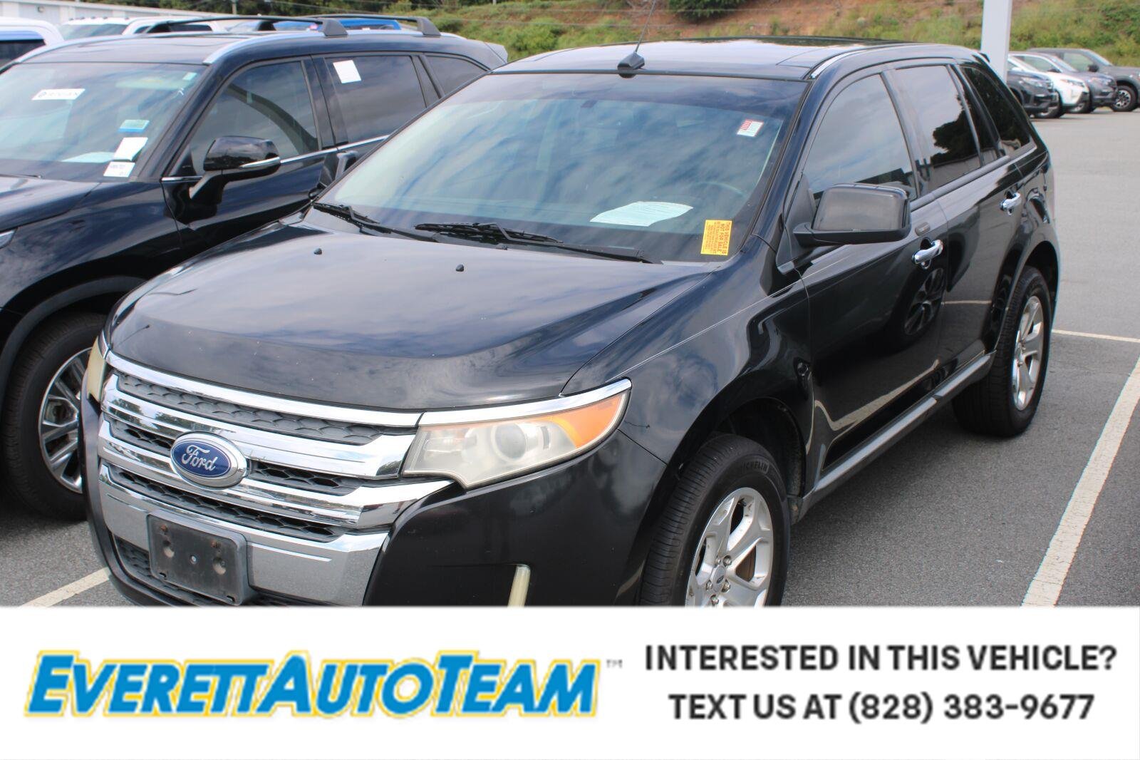 Used 2011 Tuxedo Black Metallic Ford SEL image 1