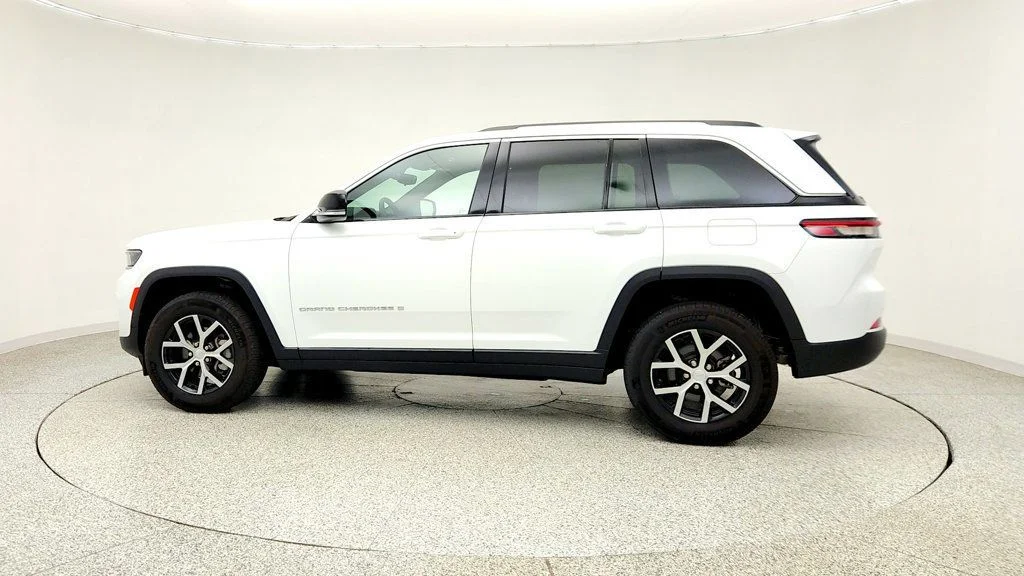 Used 2023 Bright White Clearcoat Jeep Limited 4x4 w/ 18
