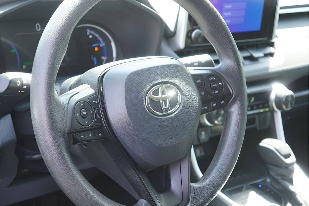 Used 2024 Magnetic Gray Metallic Toyota LE image 12
