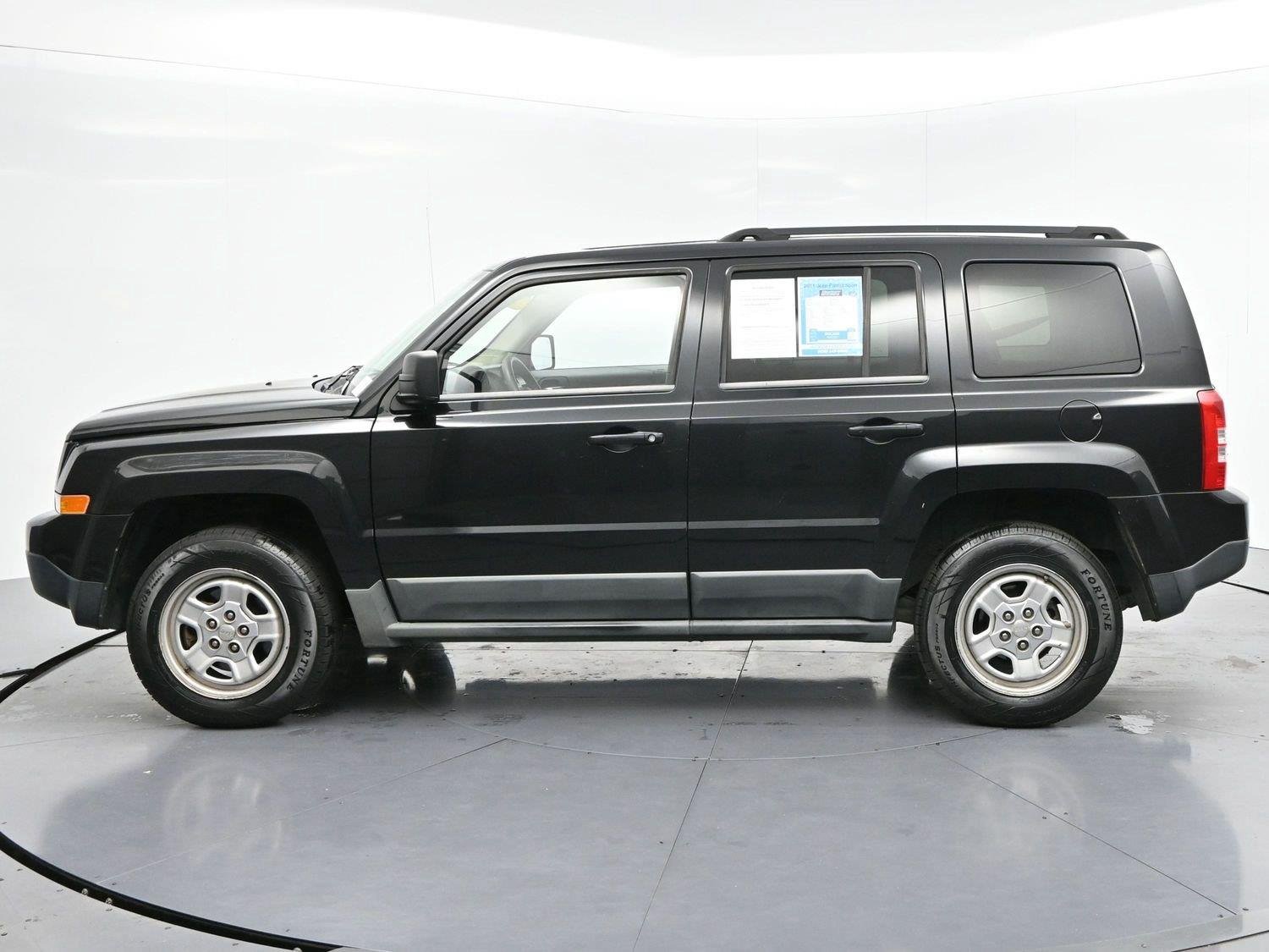 Used 2011 Brilliant Black Crystal Pearl Jeep Sport image 4