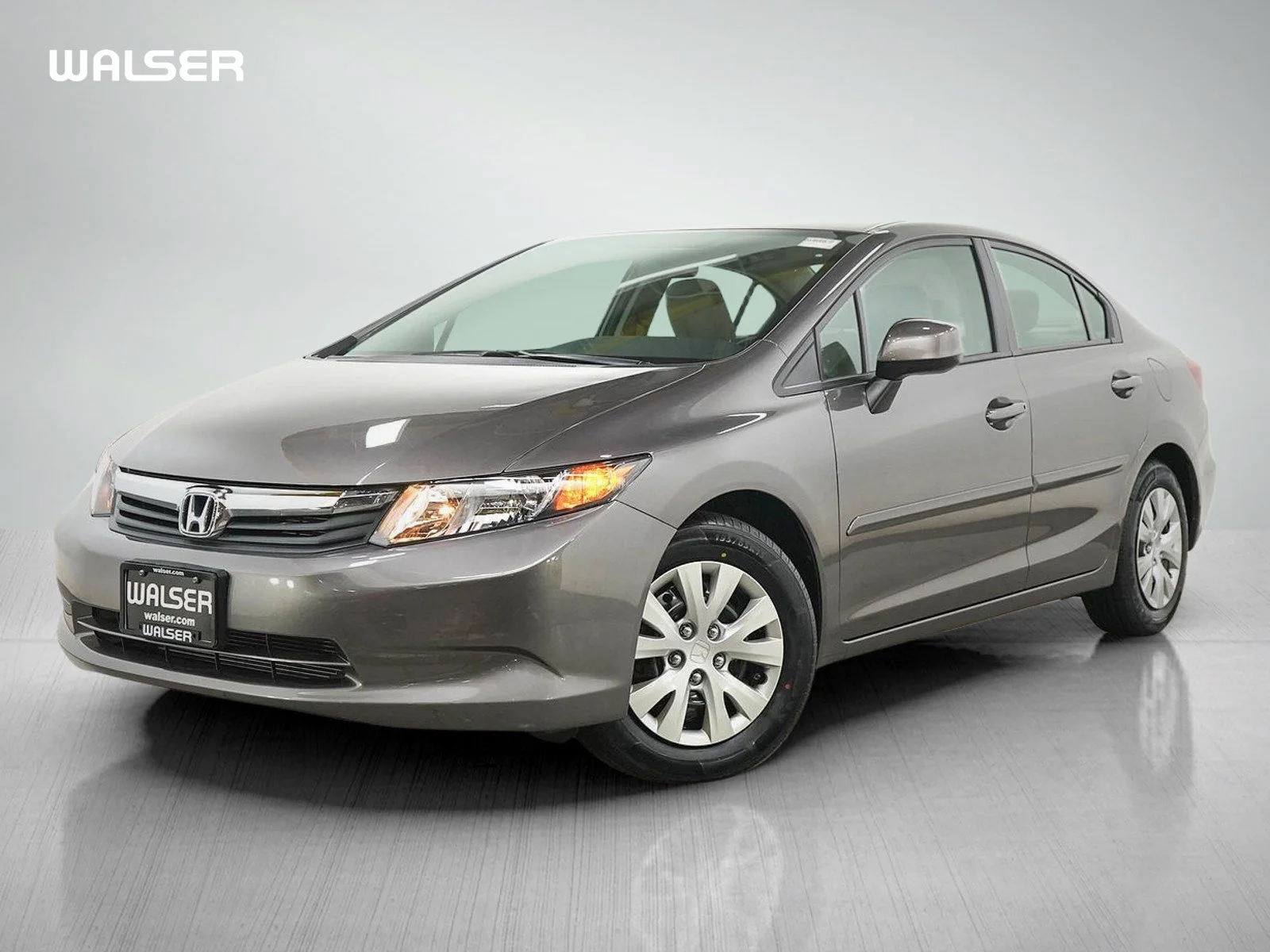 Used 2012 Urban Titanium Metallic Honda 4dr Auto LX image 1