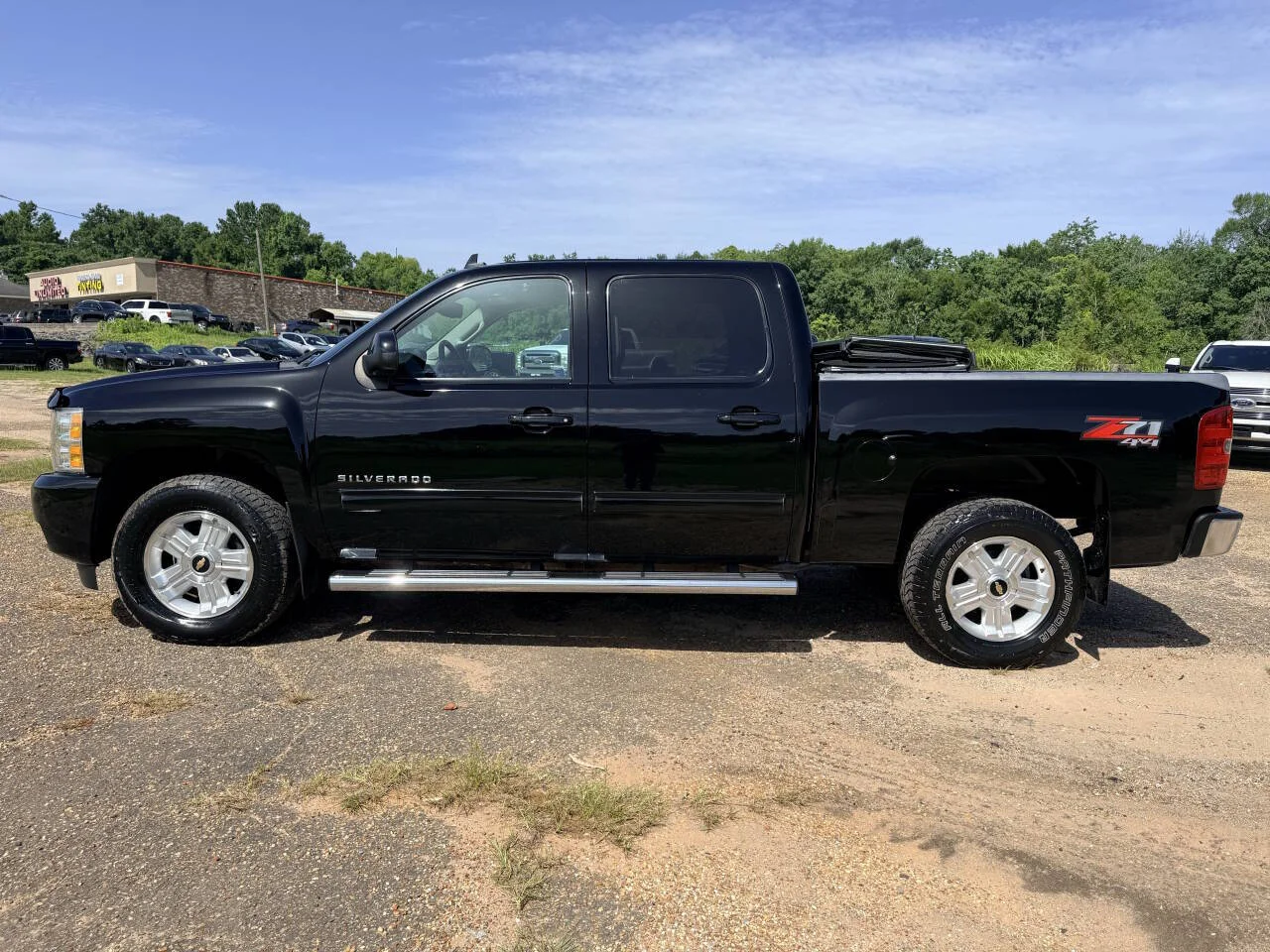 Used 2013 Black Chevrolet LTZ 4x4 4dr Crew Cab 5.8 ft. SB image 2