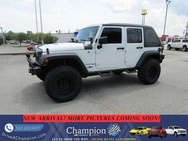 Used 2018 White Jeep Unlimited Sport image 1