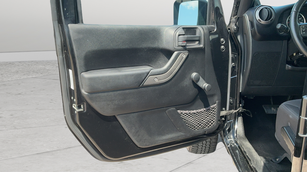 Used 2013 Black Jeep Unlimited Sport image 16