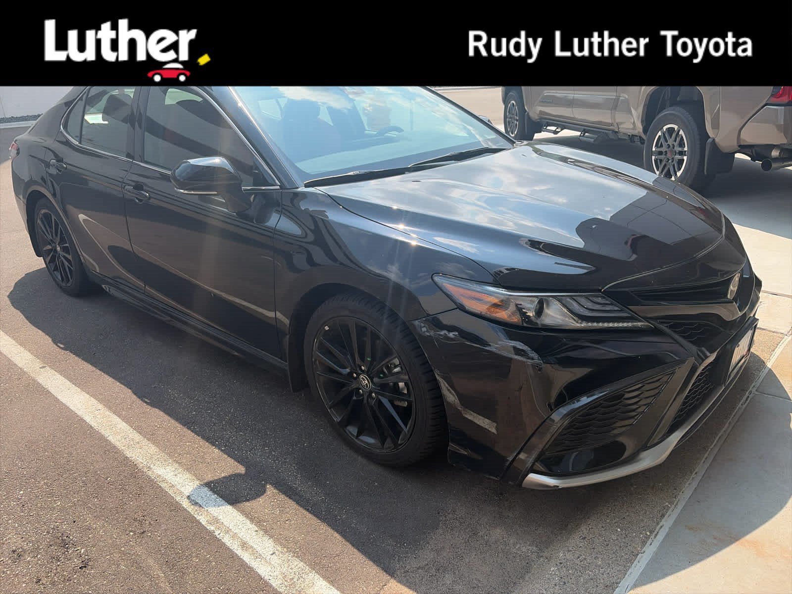 Certified Used 2024 Midnight Black Metallic Toyota XSE image 1