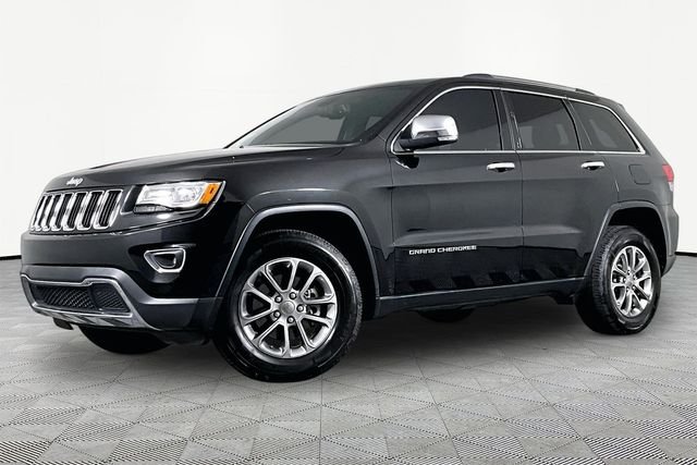 Used 2014 Black Jeep Limited image 1