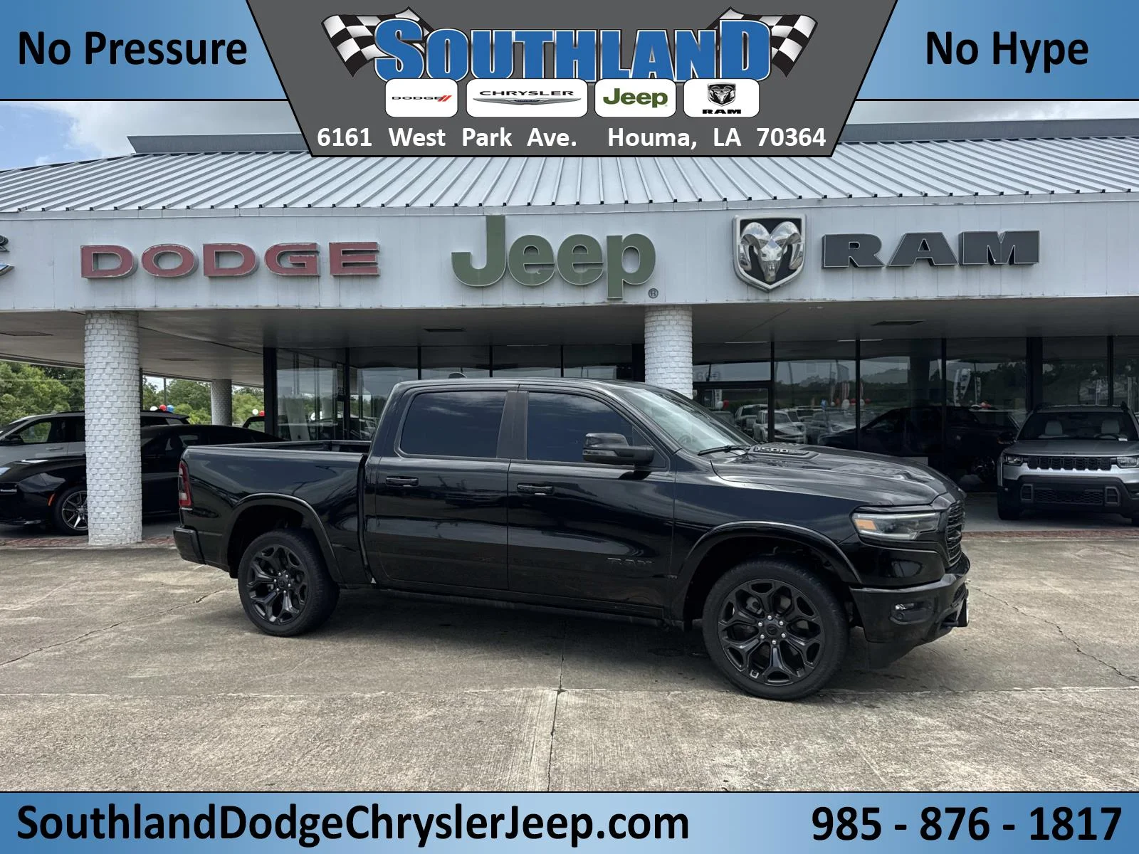 Used 2023 DIAMOND BLACK CRYSTAL PEARLCOAT Ram Limited image 1
