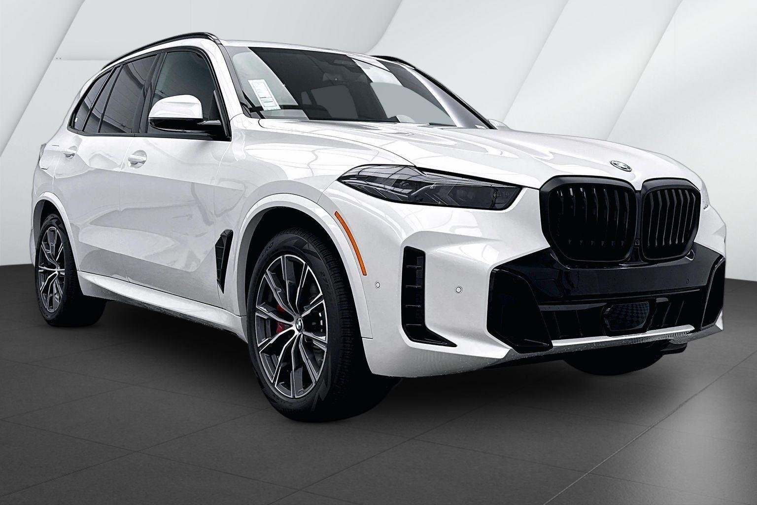 New 2026 Mineral White Metallic BMW xDrive50e image 1