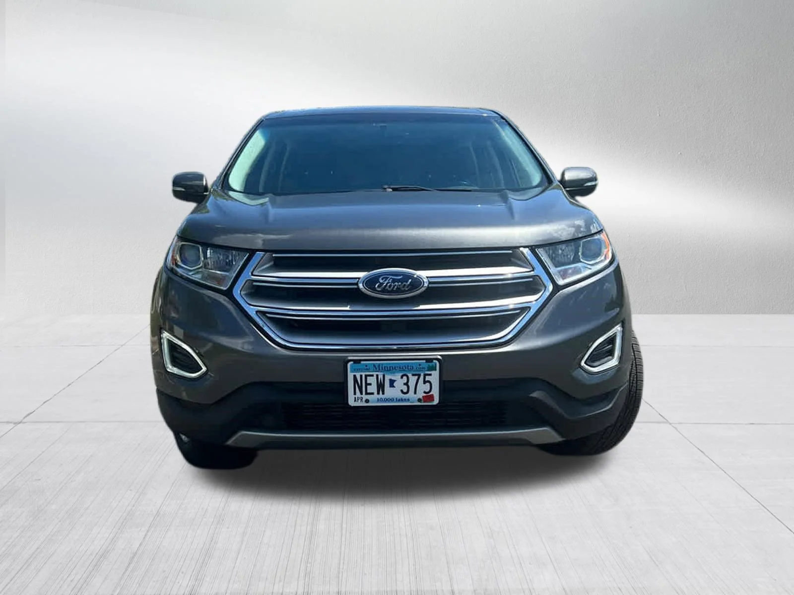 Used 2015 Magnetic Metallic Ford SEL image 2
