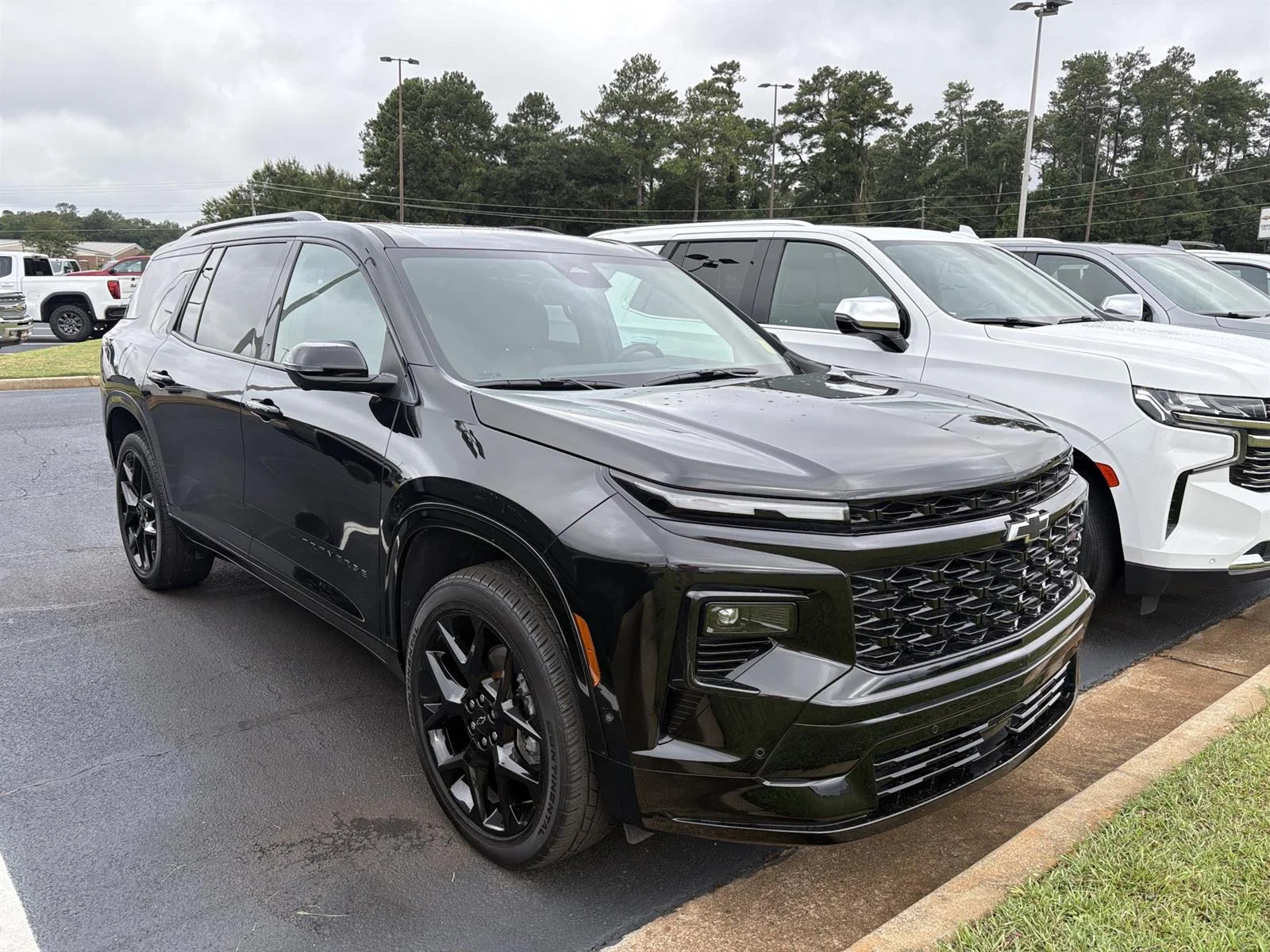 Used 2024 Mosaic Black Metallic Chevrolet RS image 1