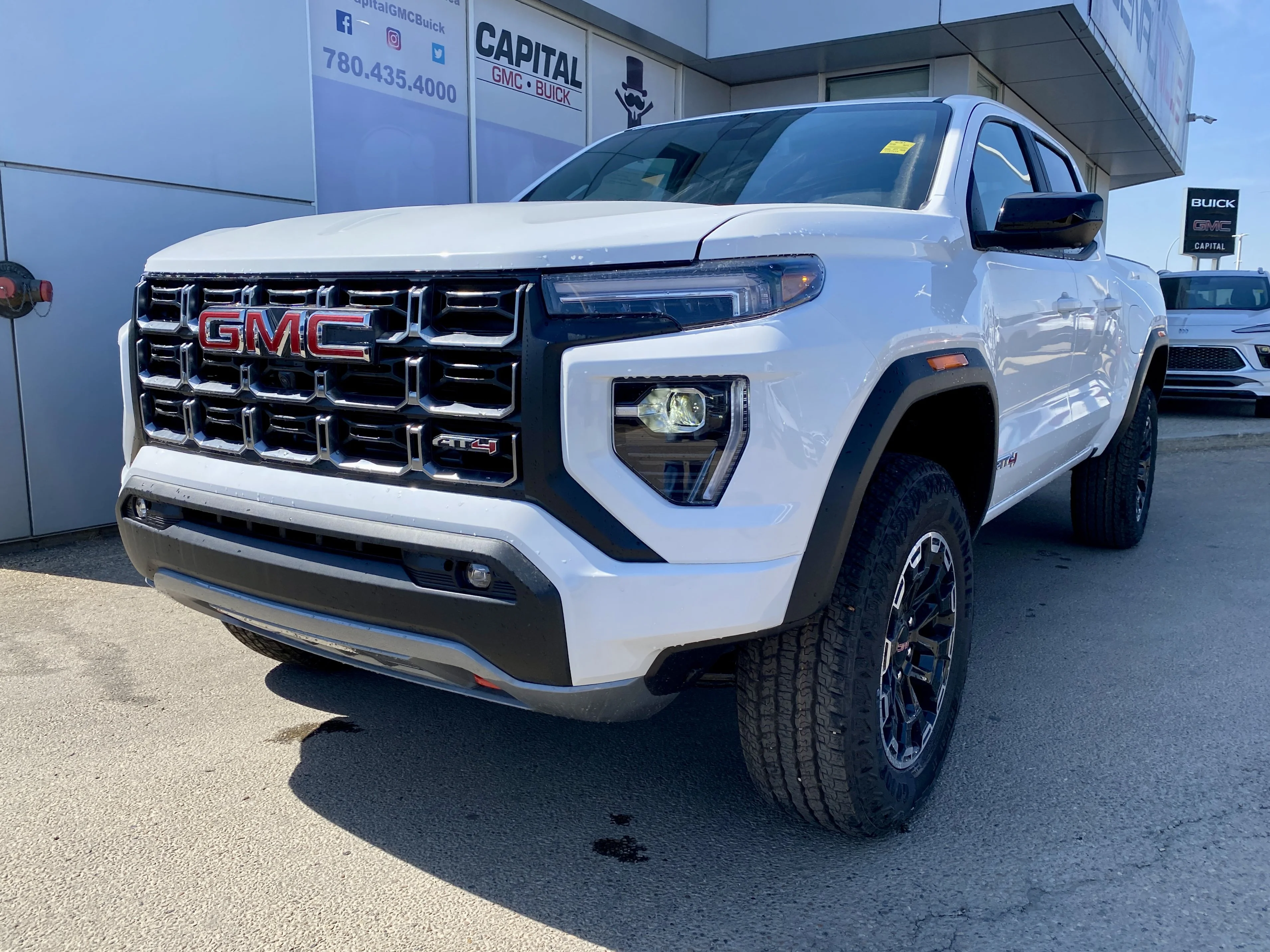 New 2026 Summit White GMC 4WD AT4 image 2