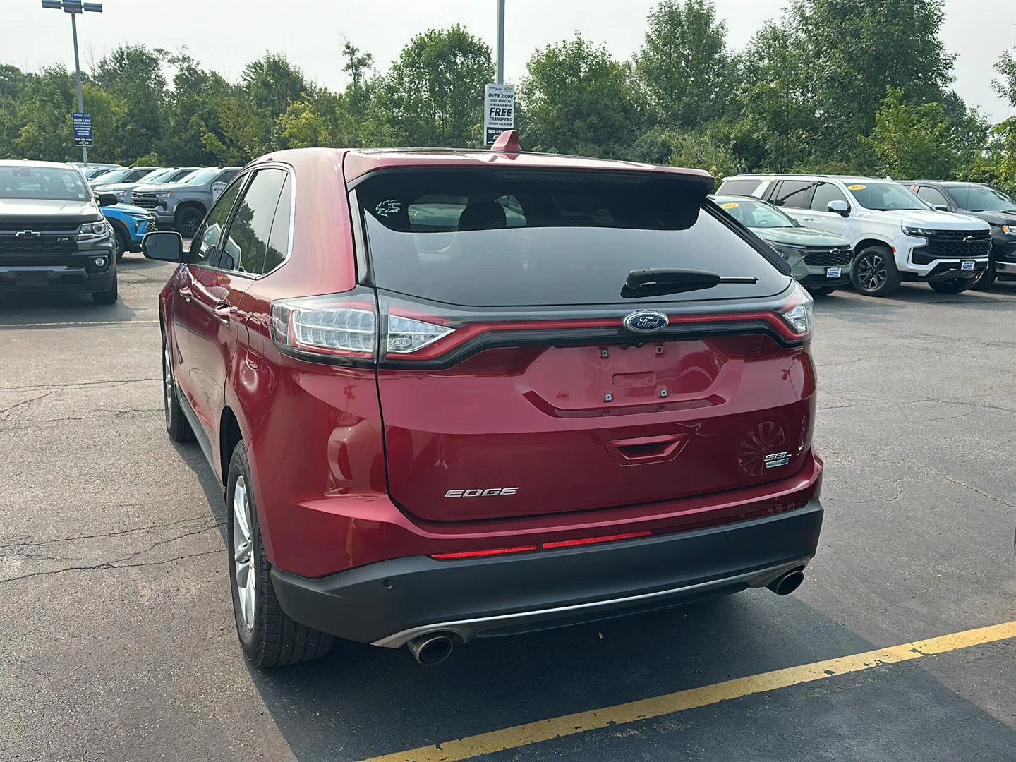 Used 2018 Ruby Red Metallic Tinted Clearcoat Ford SEL image 4