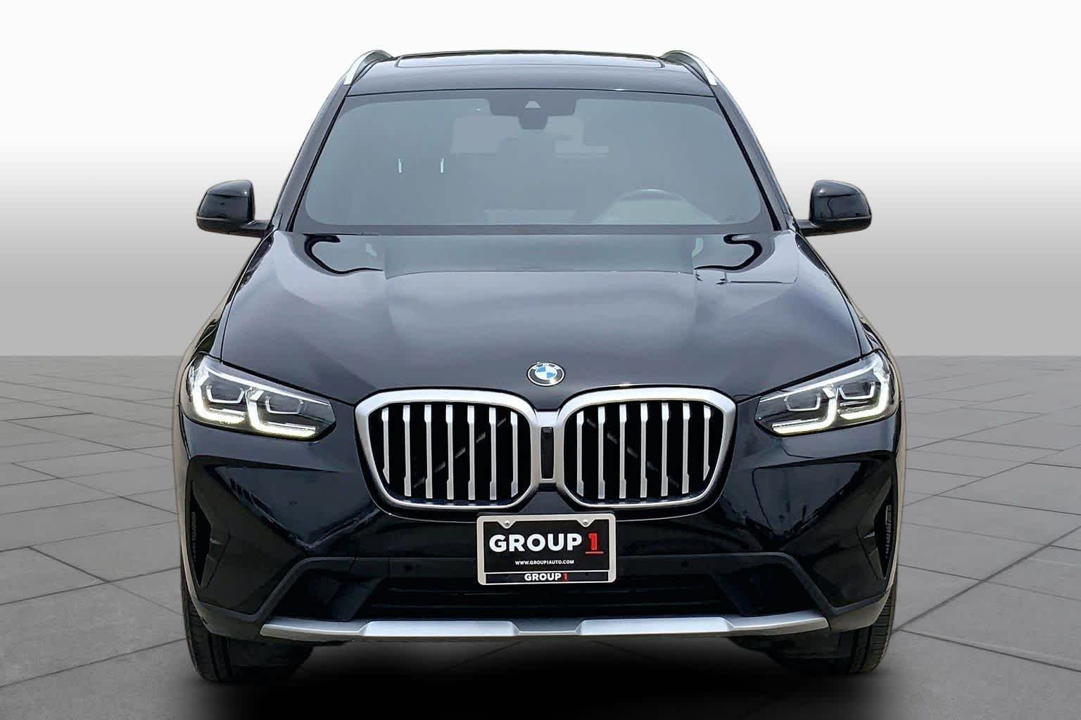 Used 2024 Black Sapphire Metallic BMW sDrive30i image 4