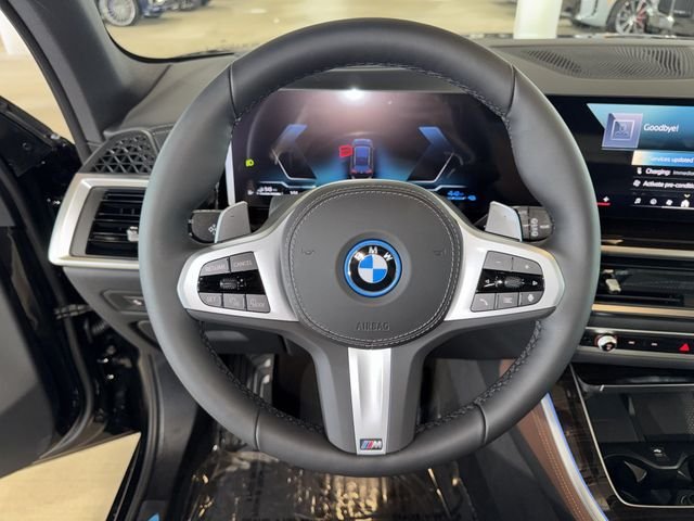 New 2026 Black Sapphire Metallic BMW xDrive50e image 16