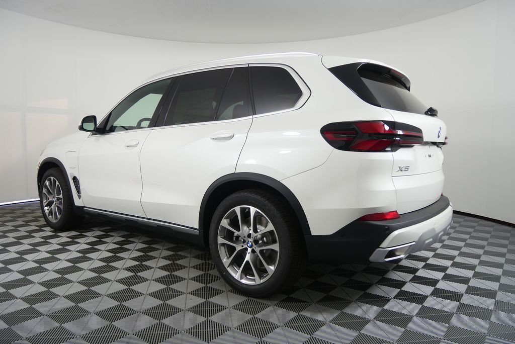 Used 2026 Mineral White Metallic BMW xDrive50e image 5