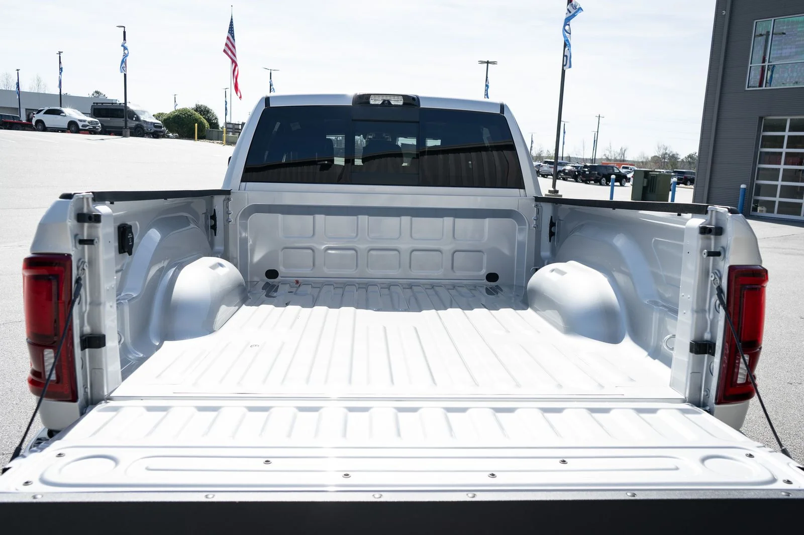 New 2026 Silver-Zynith Exterior Paint RAM Laramie image 9