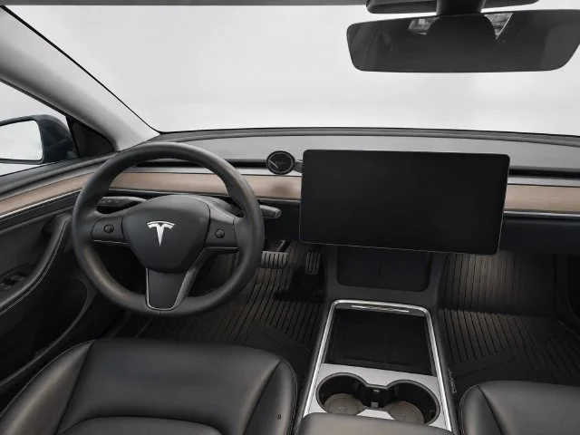 Used 2023 Solid Black Tesla Performance image 18