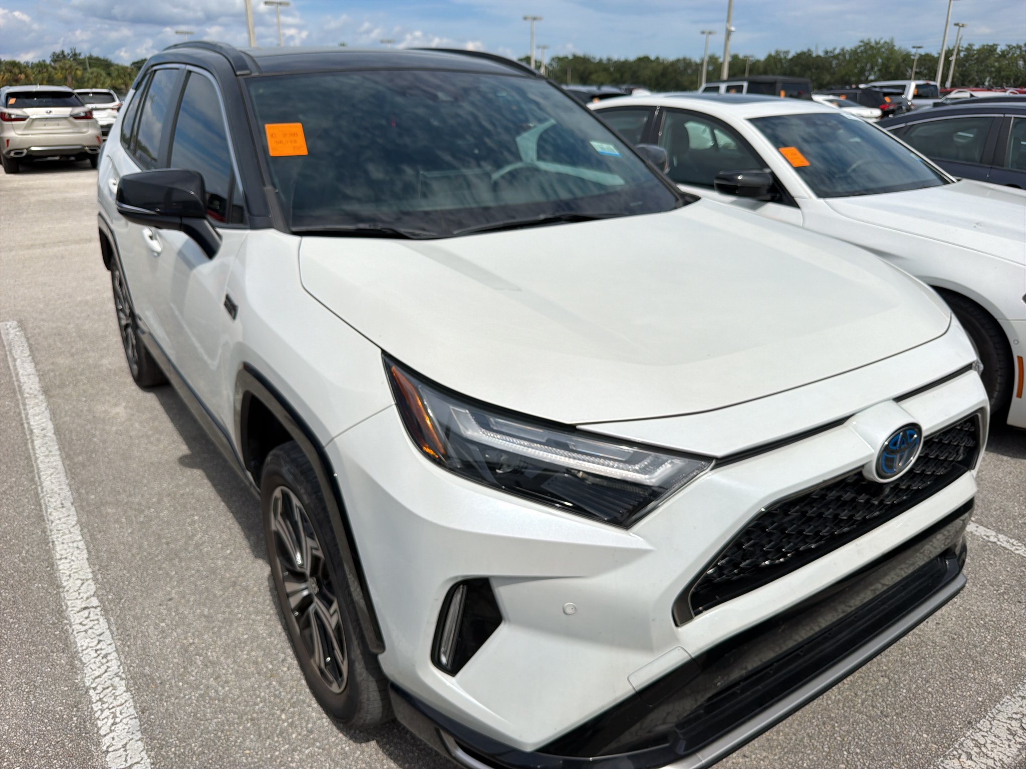 Used 2022 Blizzard Pearl/Midnight Black Metallic Toyota XSE image 1